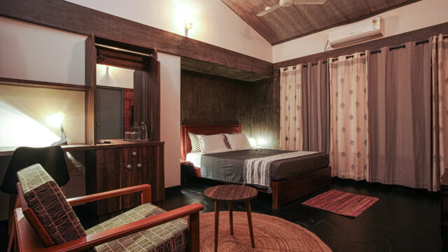 A premium luxury boutique estate villa surrounded by lush green coffee plantations in Wayanad Kerala